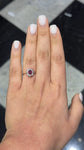 Oval Ruby and Diamond Halo Ring